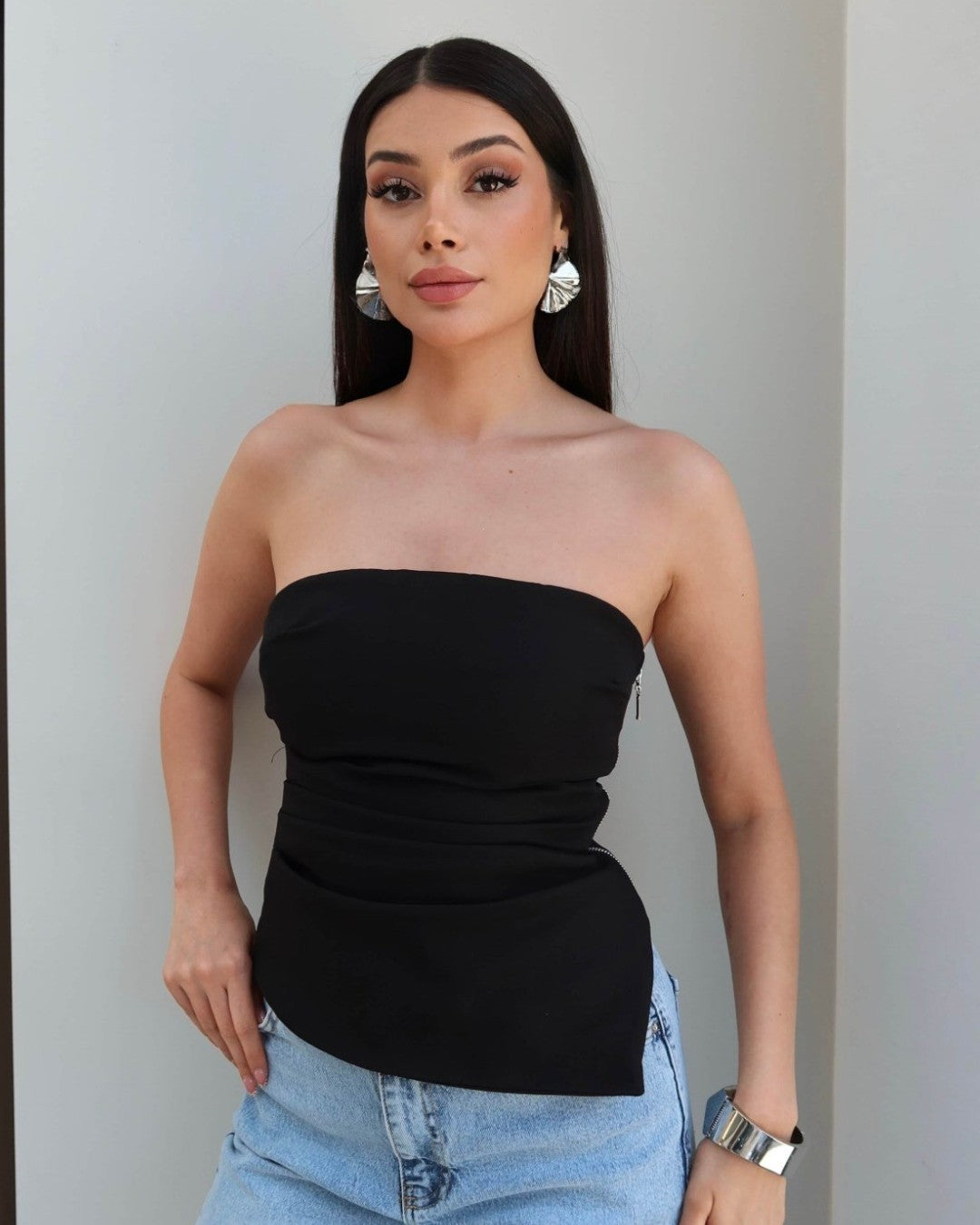 Asymmetric Muse Top