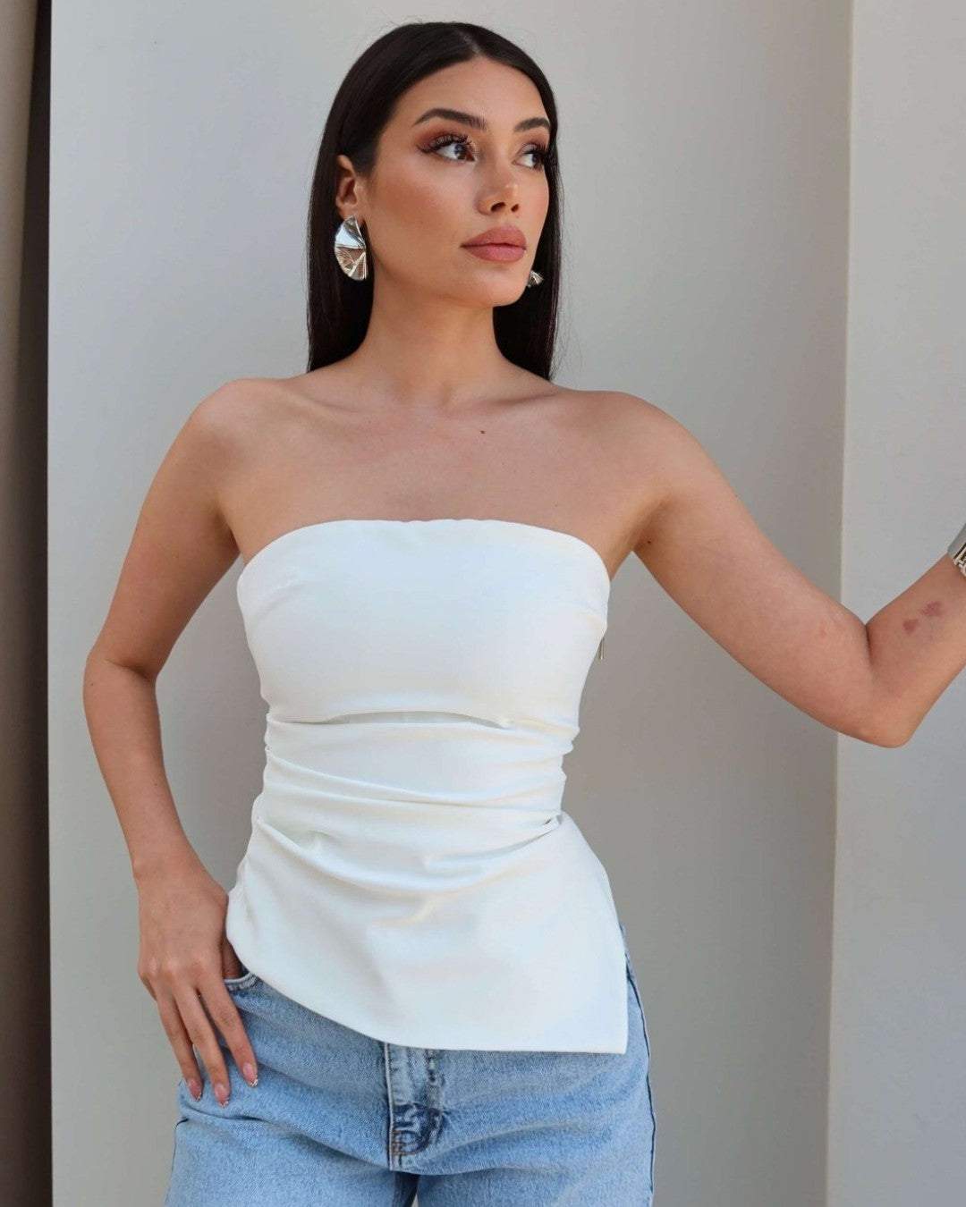 Asymmetric Muse Top