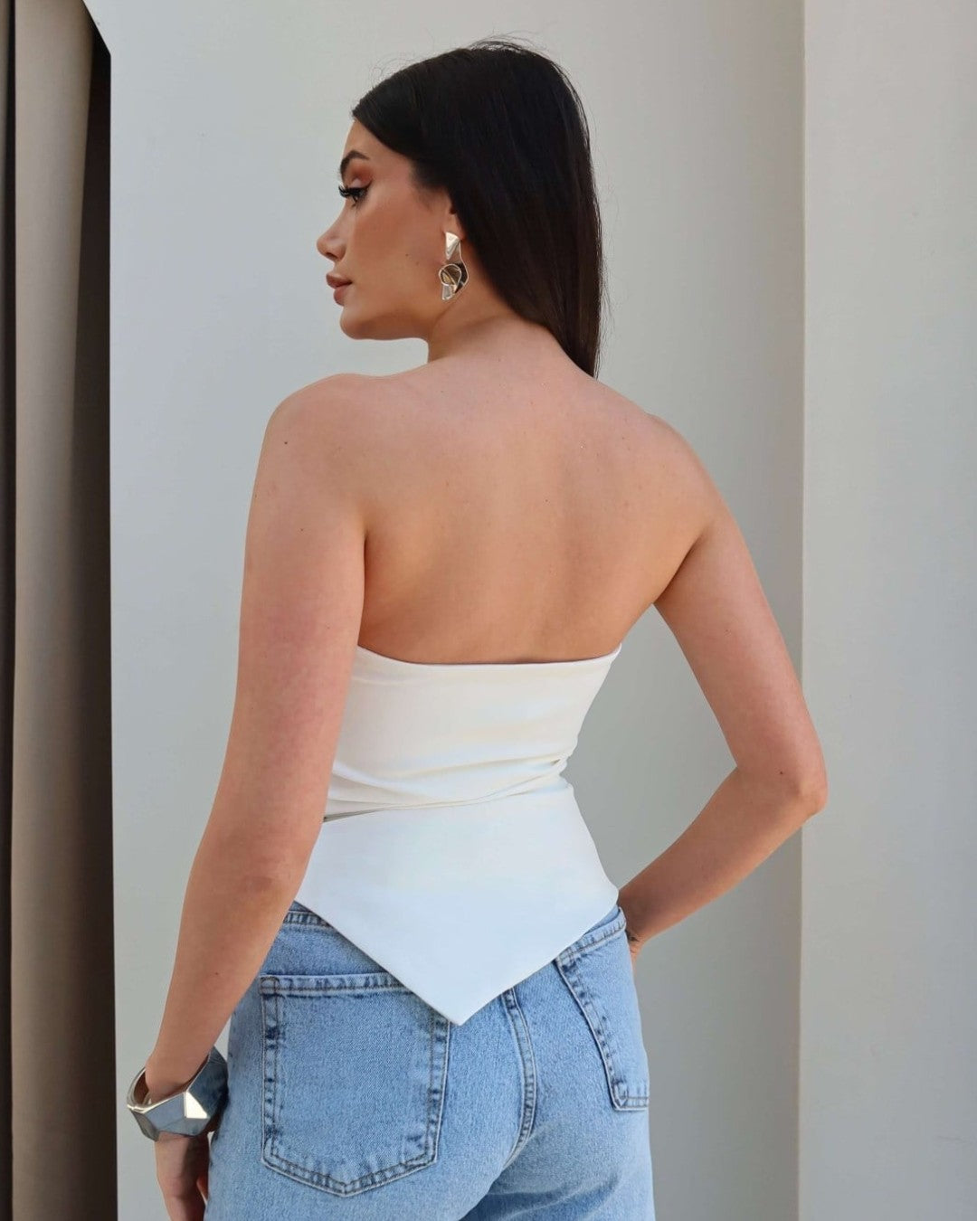 Asymmetric Muse Top
