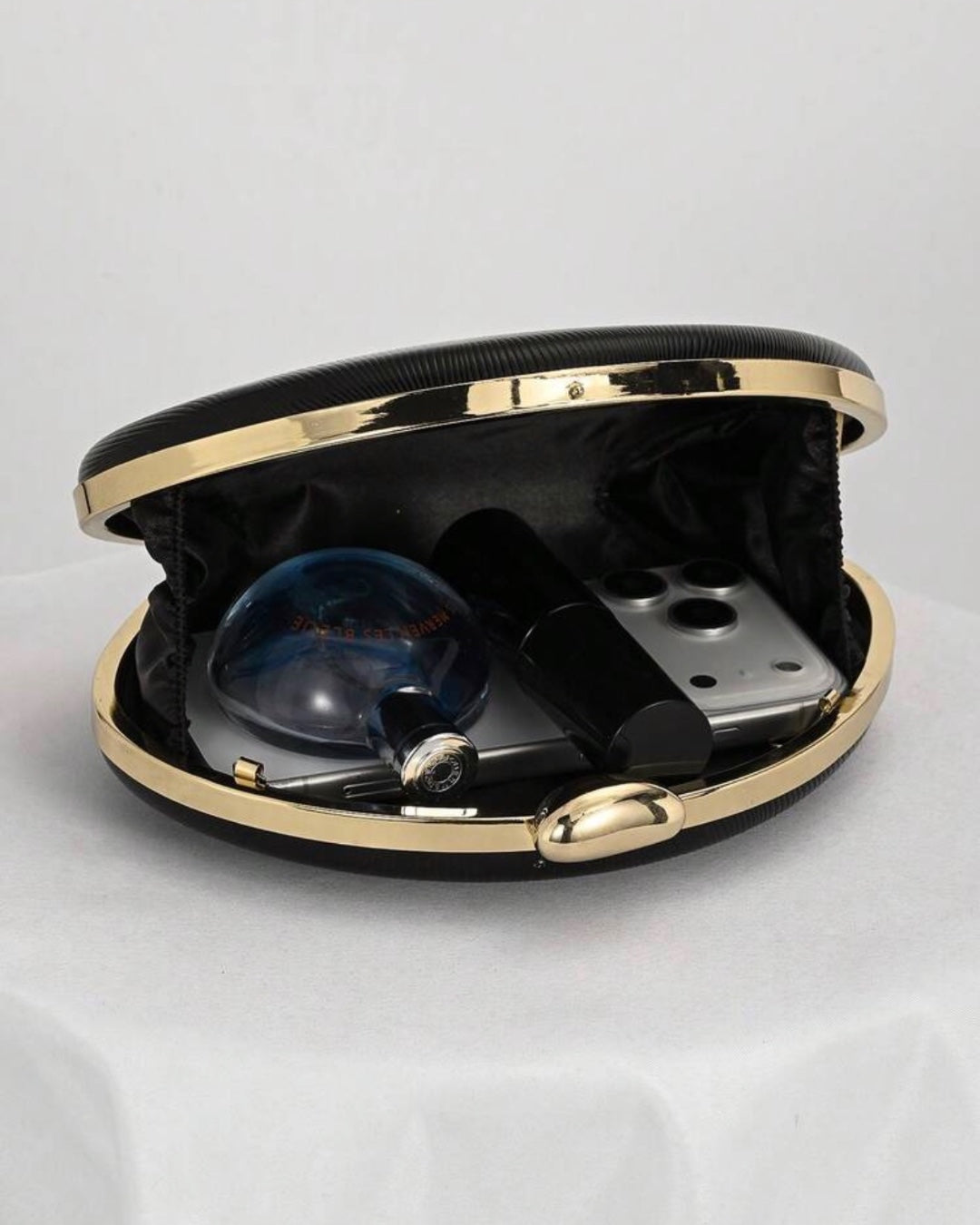 The Noir Curve Clutch