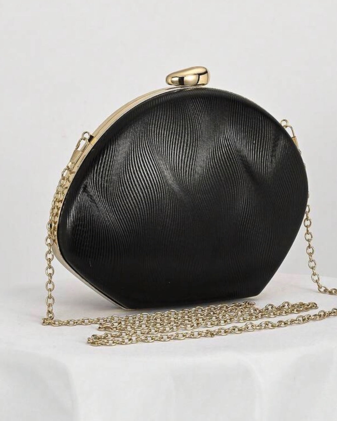 The Noir Curve Clutch