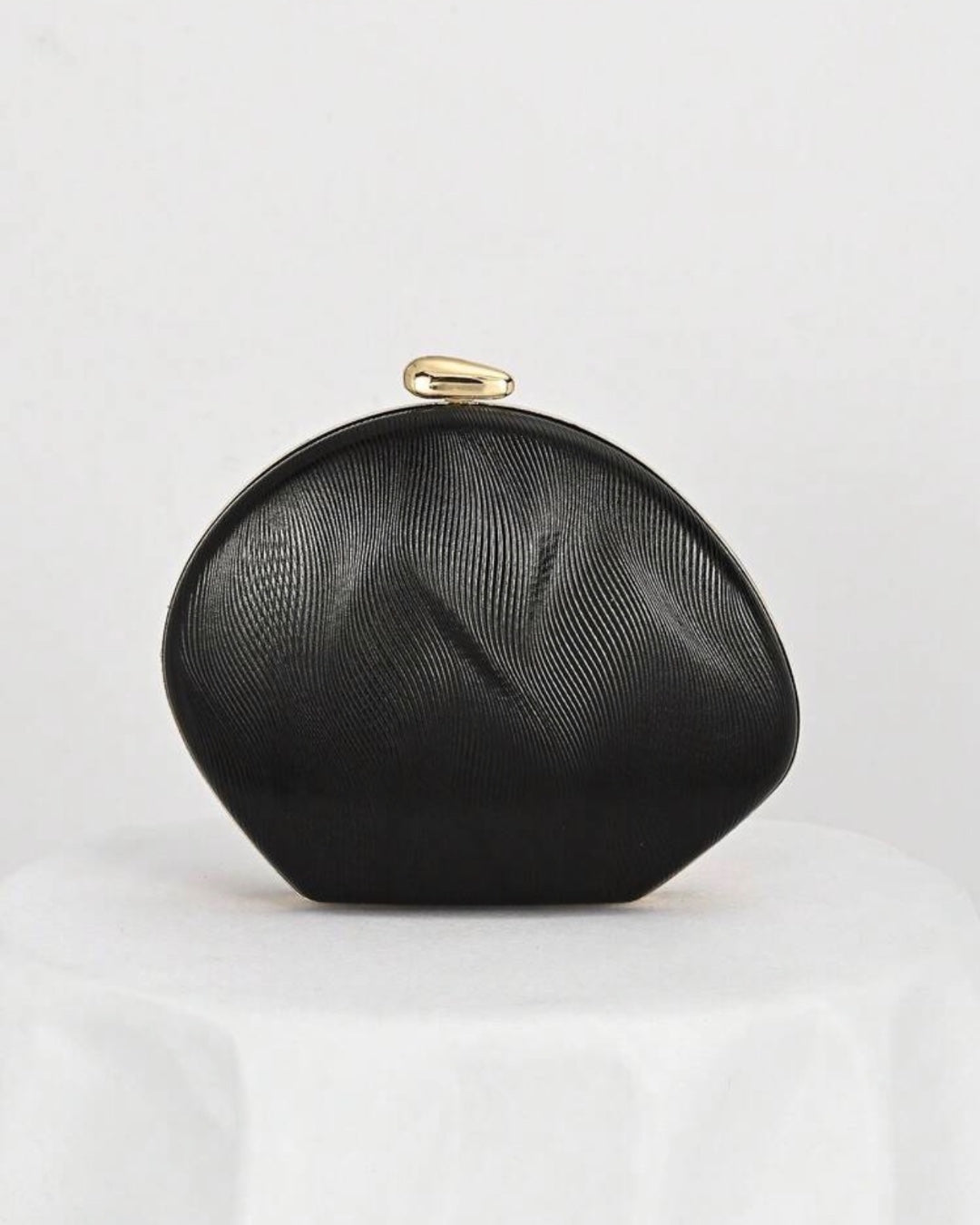 The Noir Curve Clutch